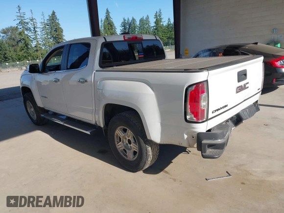 2015 GMC Canyon 2WD SLE with VIN 1GTG5CEA1F1273955, listed as a IAAI auction lot 42392908 with 79,981 mi miles and . Bid and sale history available at DreamBid. Image 3.