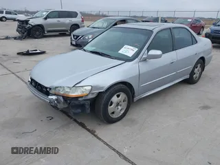 2001 Honda Accord EX z VIN 1HGCG16571A078287, wystawiony jako IAAI lot #41397391 z przebiegiem 238 239 mil mil oraz . Historia ofert i sprzedaży dostępna na DreamBid. Obrazek 2.