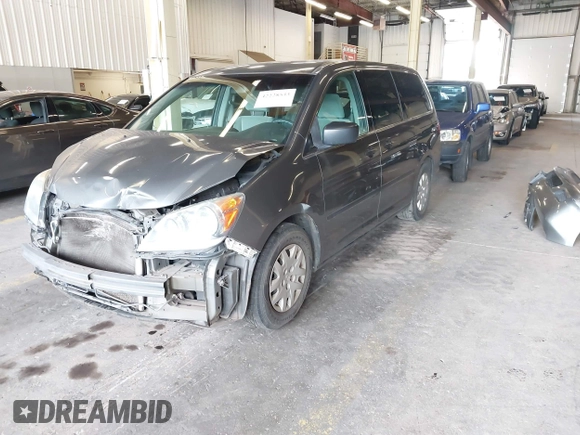 2008 Honda Odyssey LX with VIN 5FNRL38258B064490, listed as a IAAI auction lot 42228533 with 126,043 mi miles and . Bid and sale history available at DreamBid. Image 2.
