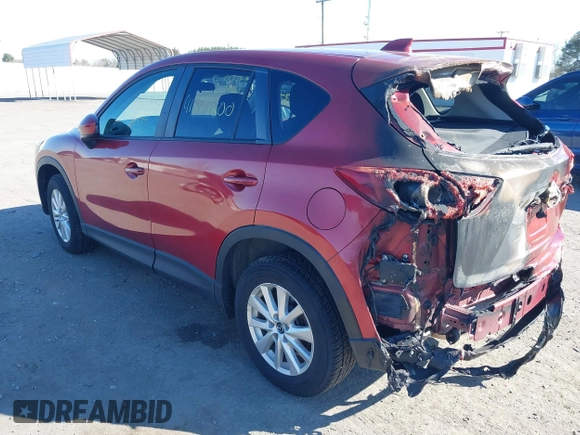 2013 Mazda CX-5 Touring with VIN JM3KE4CE7D0165324, listed as a IAAI auction lot 41879800 with 31,912 mi miles. Bid and sale history available at carsss.com. Image 3.