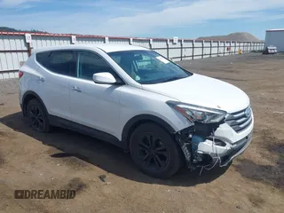 2016 Hyundai Santa Fe z VIN 5XYZTDLB9GG364375, wystawiony jako IAAI lot #42203404 z przebiegiem 143 838 mil mil oraz . Historia ofert i sprzedaży dostępna na DreamBid. Obrazek 1.