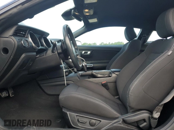 2021 Ford Mustang EcoBoost with VIN 1FA6P8THXM5112258, listed as a Copart auction lot 57501095 with 83,309 mi miles and Salvage title. Bid and sale history available at DreamBid. Image 7.
