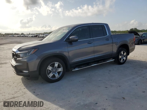 2024 Honda Ridgeline RTL with VIN 5FPYK3F57RB028966, listed as a Copart auction lot 60211885 with 10,963 mi miles and Salvage title. Bid and sale history available at DreamBid. Image 1.