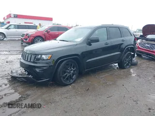 2022 Jeep Grand Cherokee Laredo X with VIN 1C4RJEAG0NC126796, listed as a IAAI auction lot 40755171 with 50,159 mi miles and . Bid and sale history available at DreamBid. Image 18.