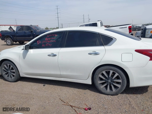 2018 Nissan Altima 2.5 SR with VIN 1N4AL3AP1JC283393, listed as a IAAI auction lot 41701104 with 142,917 mi miles. Bid and sale history available at carsss.com. Image 15.