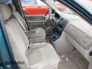 2005 Kia Sedona LX with VIN KNDUP132256743425, listed as a IAAI auction lot 42183166 with 133,719 mi miles. Bid and sale history available at carsss.com. Image 5.