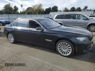 2012 BMW 7 Series with VIN WBAKX8C52CC198431, listed as a Copart auction lot 75295664 with 72,818 mi miles and Clean title. Bid and sale history available at DreamBid. Image 4.