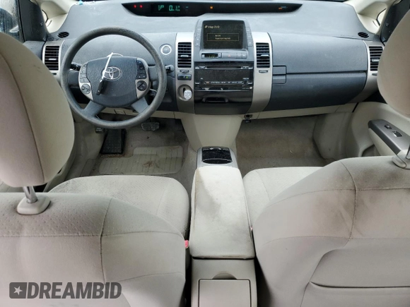 2007 Toyota Prius z VIN JTDKB20U977675087, wystawiony jako Copart lot #58346235 z przebiegiem 146 082 mil mil oraz Szkoda całkowita • Salvage title. Historia ofert i sprzedaży dostępna na DreamBid. Obrazek 8.