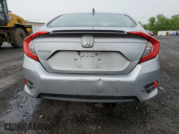 2017 Honda Civic EX-L z VIN 19XFC1F74HE209787, wystawiony jako Copart lot #56352415 z przebiegiem 130 264 mil mil oraz Szkoda całkowita • Salvage title. Historia ofert i sprzedaży dostępna na DreamBid. Obrazek 6.