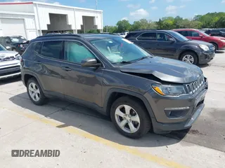 2020 Jeep Compass Latitude with VIN 3C4NJCBB3LT136018, listed as a IAAI auction lot 41915073 with 80,785 mi miles and . Bid and sale history available at carsss.com. Image 1.