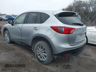 2016 Mazda CX-5 Sport with VIN JM3KE2BY5G0647715, listed as a IAAI auction lot 41831228 with 89,689 mi miles and . Bid and sale history available at carsss.com. Image 3.