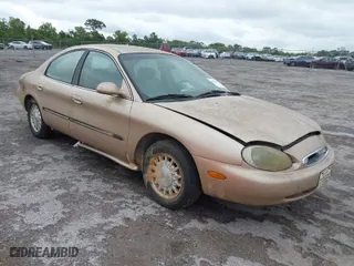 1996 Mercury Sable LS with VIN 1MELM53S6TA606332, listed as a IAAI auction lot 41984196 with 150,924 mi miles. Bid and sale history available at carsss.com. Image 1.