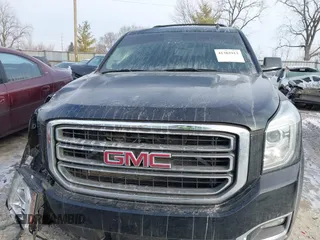 2015 GMC Yukon XL SLT with VIN 1GKS2HKC6FR257133, listed as a IAAI auction lot 41385913 with 150,238 mi miles. Bid and sale history available at carsss.com. Image 12.