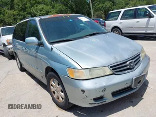 2003 Honda Odyssey EX-L with VIN 5FNRL18073B076636, listed as a IAAI auction lot 42756153 with 256,344 mi miles and . Bid and sale history available at DreamBid. Image 1.