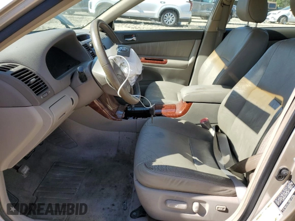 2005 Toyota Camry LE with VIN JTDBF32K750162268, listed as a Copart auction lot 53074715 with 230,037 mi miles and Salvage Title. Bid and sale history available at DreamBid. Image 7.