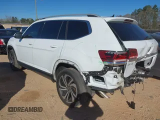 2021 Volkswagen Atlas SEL Premium z VIN 1V2TR2CA8MC562198, wystawiony jako IAAI lot #41853528 z przebiegiem 57 413 mil mil oraz . Historia ofert i sprzedaży dostępna na DreamBid. Obrazek 3.