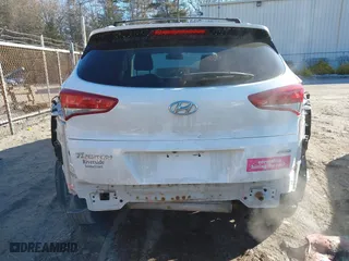 2016 Hyundai Tucson SE with VIN KM8J3CA45GU245793, listed as a IAAI auction lot 41601244 with 116,701 mi miles. Bid and sale history available at carsss.com. Image 6.