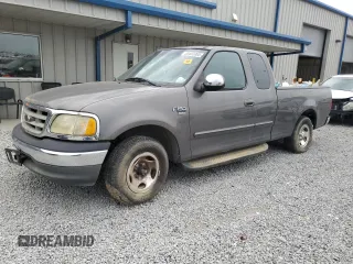 2002 Ford F-150 XL z VIN 2FTRX17W92CA77061, wystawiony jako Copart lot #55402065 z przebiegiem 232 273 mil mil oraz Szkoda całkowita • Salvage title. Historia ofert i sprzedaży dostępna na DreamBid. Obrazek 1.