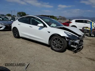 2021 Tesla Model 3 Standard Range Plus with VIN 5YJ3E1EA1MF871986, listed as a Copart auction lot 53389475 with Not Provided miles and Salvage Title. Bid and sale history available at DreamBid. Image 4.