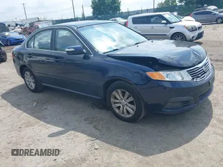 2010 Kia Optima LX z VIN KNAGG4A8XA5387583, wystawiony jako IAAI lot #42377403 z przebiegiem 142 535 mil mil oraz . Historia ofert i sprzedaży dostępna na DreamBid. Obrazek 1.