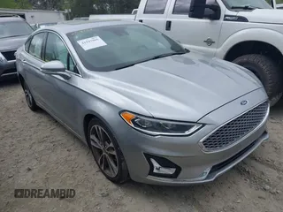 2020 Ford Fusion Titanium with VIN 3FA6P0K91LR128016, listed as a IAAI auction lot 41947905 with 79,622 mi miles and . Bid and sale history available at DreamBid. Image 1.