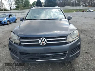 2012 Volkswagen Touareg Sport with VIN WVGEK9BP7CD006059, listed as a Copart auction lot 49411245 with 202,323 mi miles and Clean Title. Bid and sale history available at DreamBid. Image 5.