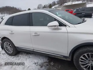 2016 Lincoln MKX Select with VIN 2LMTJ8KR3GBL31765, listed as a IAAI auction lot 41352530 with 155,376 mi miles. Bid and sale history available at carsss.com. Image 13.