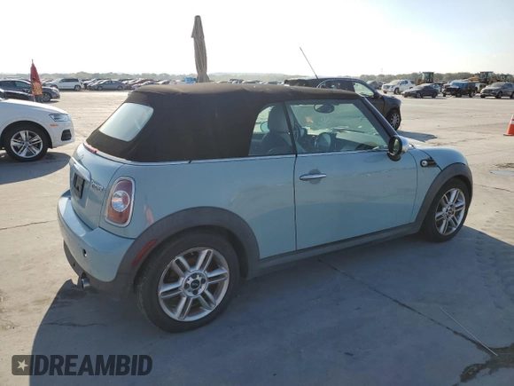 2013 MINI Convertible z VIN WMWZN3C57DT569379, wystawiony jako Copart lot #71982954 z przebiegiem 152 142 mil mil oraz Czysty tytuł • Clean title. Historia ofert i sprzedaży dostępna na DreamBid. Obrazek 3.