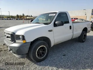 2002 Ford Super Duty F-250 XL with VIN 1FTNF20L52ED47162, listed as a Copart auction lot 79675304 with 216,687 mi miles and Salvage Title. Bid and sale history available at carsss.com. Image 1.