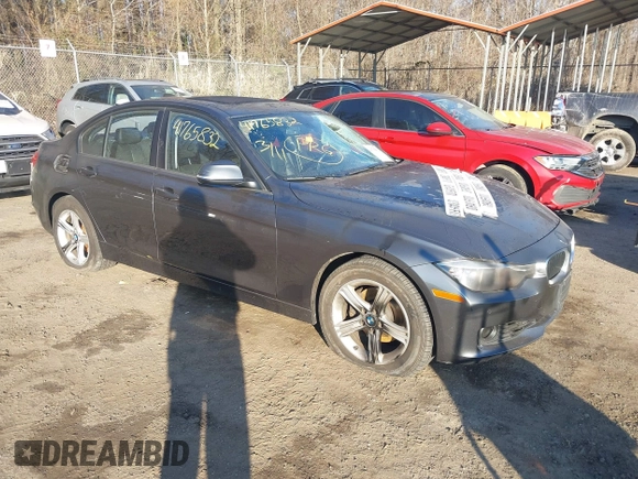 2015 BMW 3 Series 328i xDrive with VIN WBA3B5G55FNS19437, listed as a IAAI auction lot 41765832 with 137,993 mi miles. Bid and sale history available at carsss.com. Image 1.