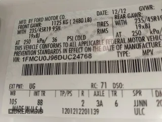 2013 Ford Escape Titanium with VIN 1FMCU0J96DUC24768, listed as a IAAI auction lot 42024198 with 93,080 mi miles. Bid and sale history available at carsss.com. Image 9.