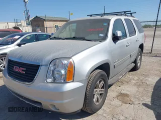 2013 GMC Yukon SLT with VIN 1GKS1CE09DR268602, listed as a IAAI auction lot 41992325 with 167,476 mi miles. Bid and sale history available at carsss.com. Image 6.