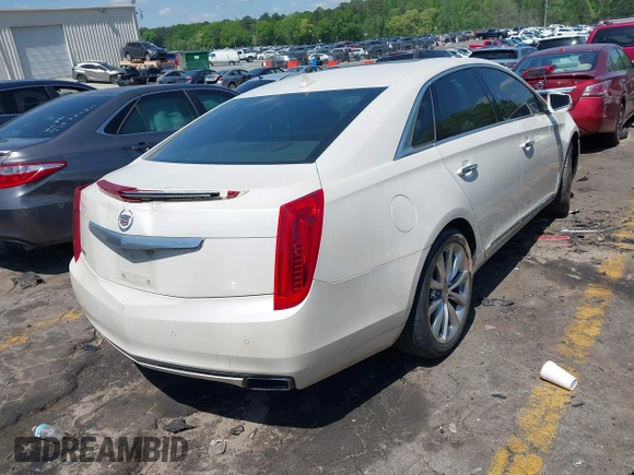 2014 Cadillac XTS Luxury with VIN 2G61M5S32E9310910, listed as a IAAI auction lot 41978298 with Not provided miles and . Bid and sale history available at DreamBid. Image 4.