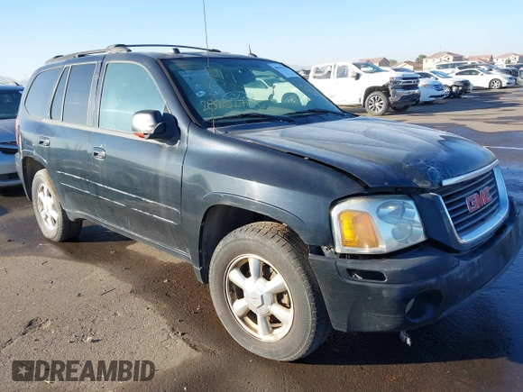 2005 GMC Envoy SLE with VIN 1GKDT13S752161375, listed as a IAAI auction lot 40945627 with 172,757 mi miles. Bid and sale history available at carsss.com. Image 1.