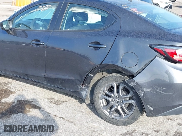 2019 Toyota Yaris Sedan L with VIN 3MYDLBYVXKY506966, listed as a IAAI auction lot 41455800 with 106,284 mi miles. Bid and sale history available at carsss.com. Image 6.