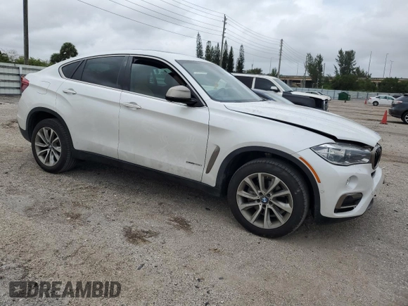 2018 BMW X6 sDrive35i with VIN 5UXKU0C5XJ0G80559, listed as a Copart auction lot 79767994 with 68,731 mi miles and Salvage Title. Bid and sale history available at carsss.com. Image 4.