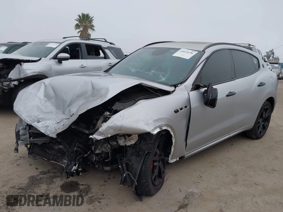 2017 Maserati Levante with VIN ZN661XUSXHX216080, listed as a IAAI auction lot 42024196 with 98,842 mi miles. Bid and sale history available at carsss.com. Image 2.