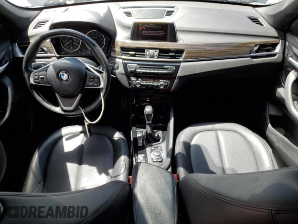2016 BMW X1 xDrive28i z VIN WBXHT3C34GP883767, wystawiony jako Copart lot #56708375 z przebiegiem 96 285 mil mil oraz Szkoda całkowita • Salvage title. Historia ofert i sprzedaży dostępna na DreamBid. Obrazek 8.