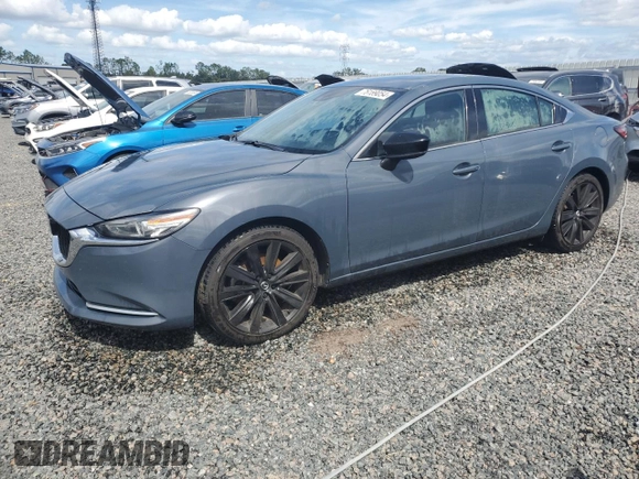 2021 Mazda 6 Grand Touring Reserve with VIN JM1GL1WY6M1617833, listed as a Copart auction lot 76189054 with 131,217 mi miles and Non Repairable. Bid and sale history available at DreamBid. Image 1.