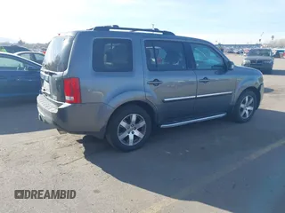 2013 Honda Pilot Touring with VIN 5FNYF4H94DB035692, listed as a IAAI auction lot 41771116 with 137,464 mi miles and . Bid and sale history available at carsss.com. Image 4.