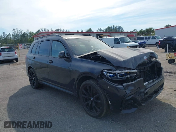 2022 BMW X7 M50i z VIN 5UXCX6C08N9M15818, wystawiony jako IAAI lot #41434065 z przebiegiem 52 740 mil mil oraz . Historia ofert i sprzedaży dostępna na DreamBid. Obrazek 13.
