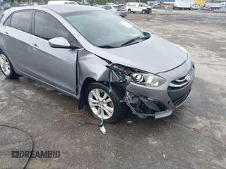 2013 Hyundai Elantra GT with VIN KMHD35LE1DU058318, listed as a IAAI auction lot 42036716 with 146,845 mi miles. Bid and sale history available at carsss.com. Image 6.