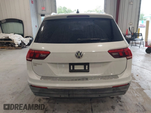 2019 Volkswagen Tiguan SE with VIN 3VV3B7AX9KM030028, listed as a IAAI auction lot 40445099 with 85,400 mi miles and . Bid and sale history available at DreamBid. Image 16.