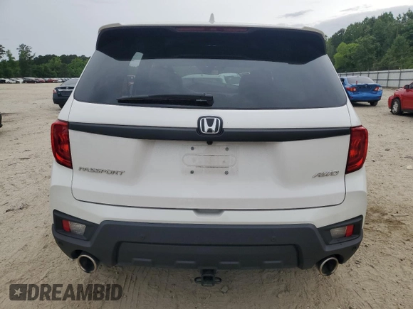 2023 Honda Passport EX-L z VIN 5FNYF8H51PB033343, wystawiony jako Copart lot #56594665 z przebiegiem 18 554 mil mil oraz Szkoda całkowita • Salvage title. Historia ofert i sprzedaży dostępna na DreamBid. Obrazek 6.