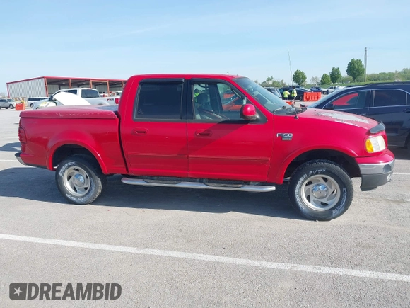 2003 Ford F-150 XLT with VIN 1FTRW08L43KD14456, listed as a IAAI auction lot 42098830 with 234,908 mi miles. Bid and sale history available at carsss.com. Image 14.