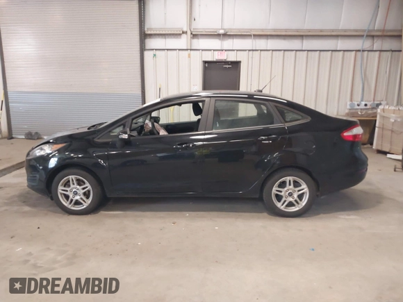 2018 Ford Fiesta SE z VIN 3FADP4BJ3JM141658, wystawiony jako IAAI lot #41737201 z przebiegiem 92 078 mil mil oraz . Historia ofert i sprzedaży dostępna na DreamBid. Obrazek 14.