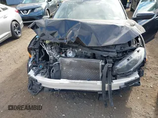 2019 Honda Civic LX with VIN 2HGFC2F65KH549993, listed as a IAAI auction lot 40394538 with 92,951 mi miles and . Bid and sale history available at DreamBid. Image 6.