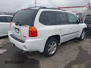 2008 GMC Envoy SLE2 with VIN 1GKDT13S482144358, listed as a IAAI auction lot 41797841 with 123,287 mi miles. Bid and sale history available at carsss.com. Image 4.