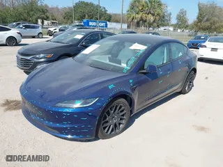 2025 Tesla Model 3 Long Range with VIN 5YJ3E1EB4SF876945, listed as a IAAI auction lot 41518965 with 591 mi miles. Bid and sale history available at carsss.com. Image 16.