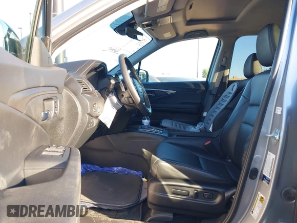 2022 Honda Ridgeline RTL-E with VIN 5FPYK3F78NB016045, listed as a IAAI auction lot 41626864 with 57,130 mi miles and . Bid and sale history available at DreamBid. Image 5.